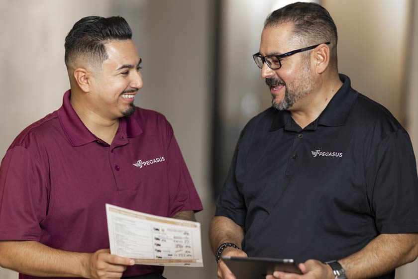 core-4 2 cleaners reviewing the tasks of the day